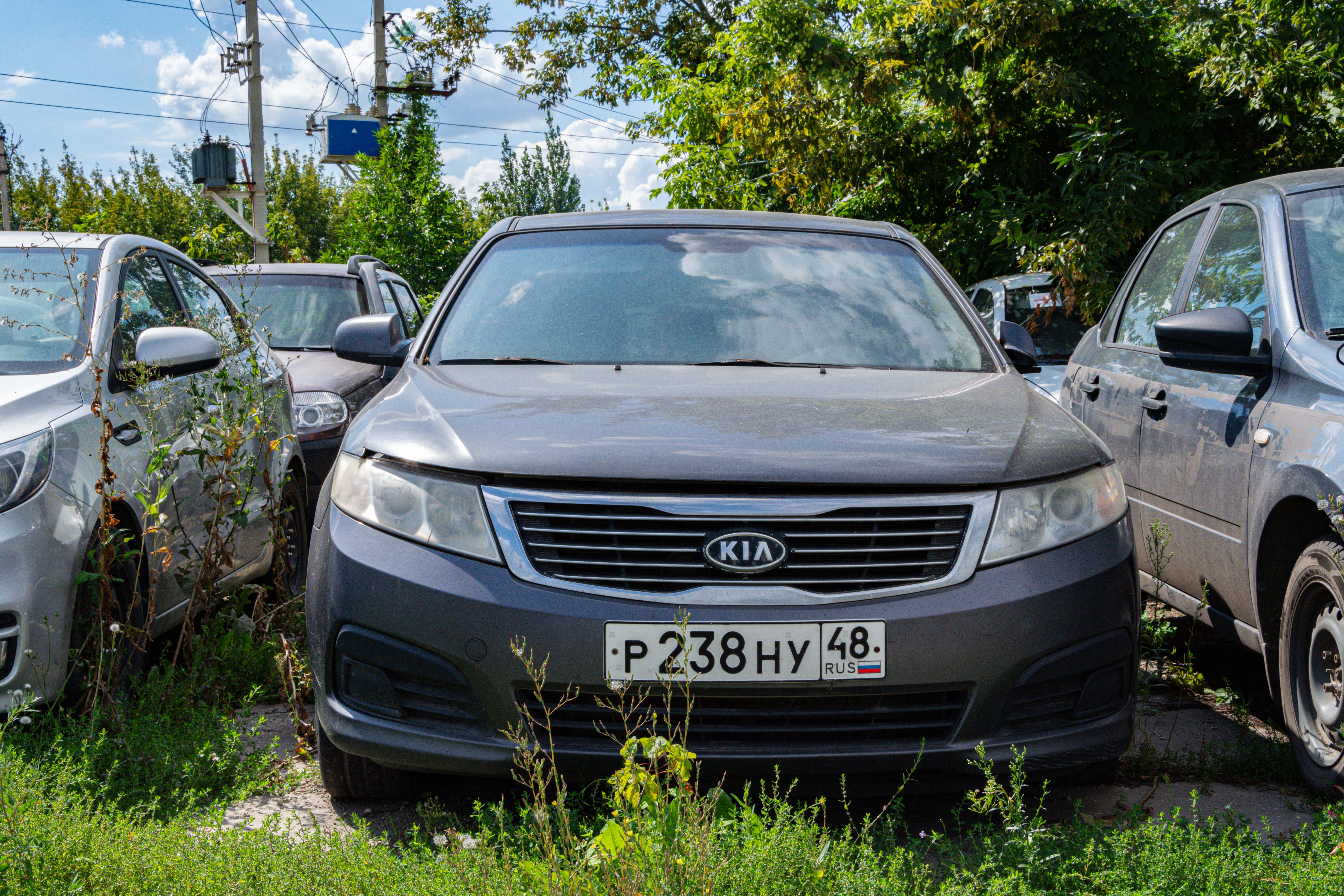 Легковой автомобиль KIA GE (MAGENTIS/OPTI), 2009 года выпуска, идентификационный номер (VIN): XWEGE227290000284, цвет кузова – серый.