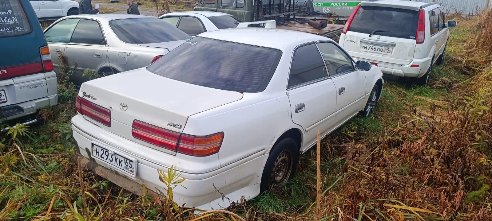 Автомобиль марки” Toyota Mark 2”, государственный номер Н 293 КК 65