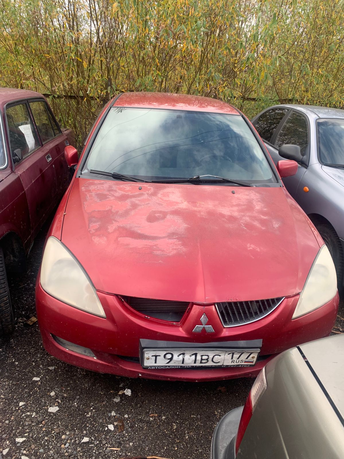 Лот № 8. Автомобиль "MITSUBISHI LANCER", VIN: JMBSRCS3A5U011312, г.р.з. Т911ВС177, 2005 г.в., красного цвета, имеются ключи, СТС, ПТС (11-007874-1)