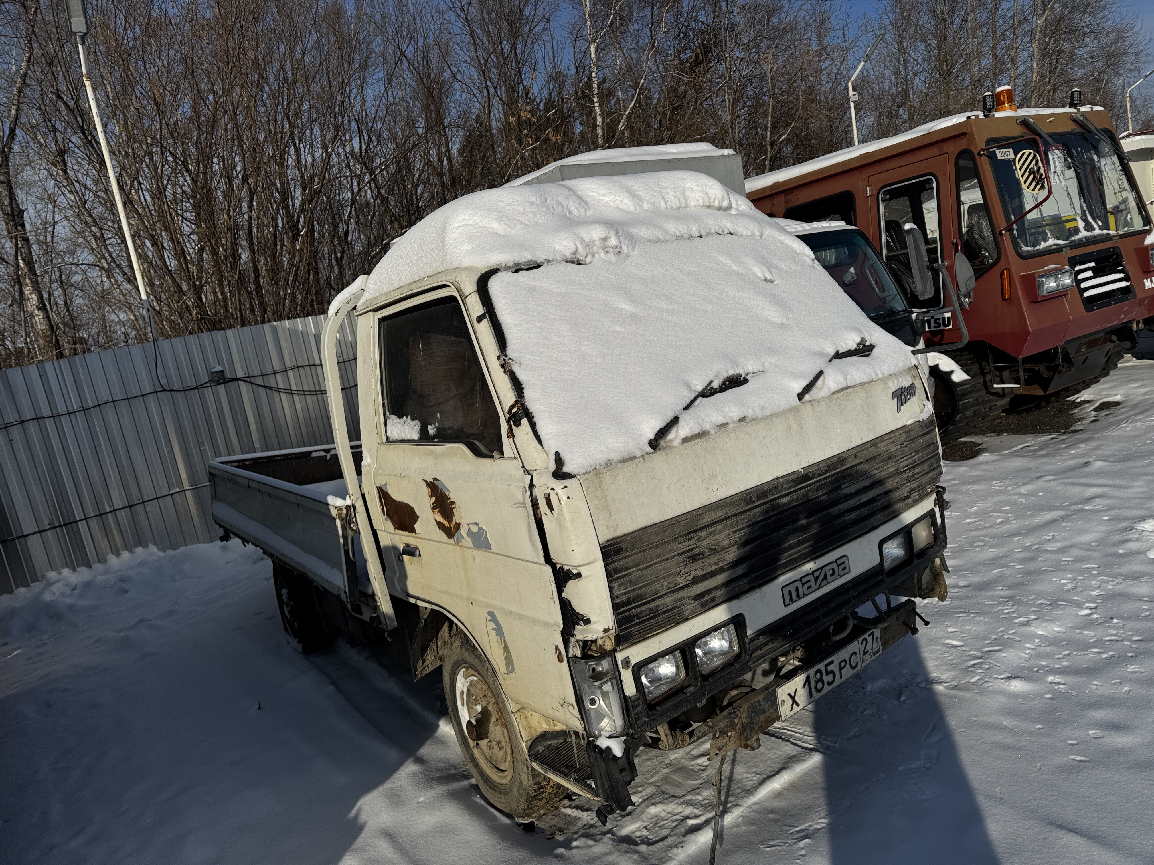 Автомобиль марки Mazda Titan, г/н Х185РС27, по карточке ТС 1988 г.в., № двигателя 36105 , № кузова WE5AT406741 , цвет белый