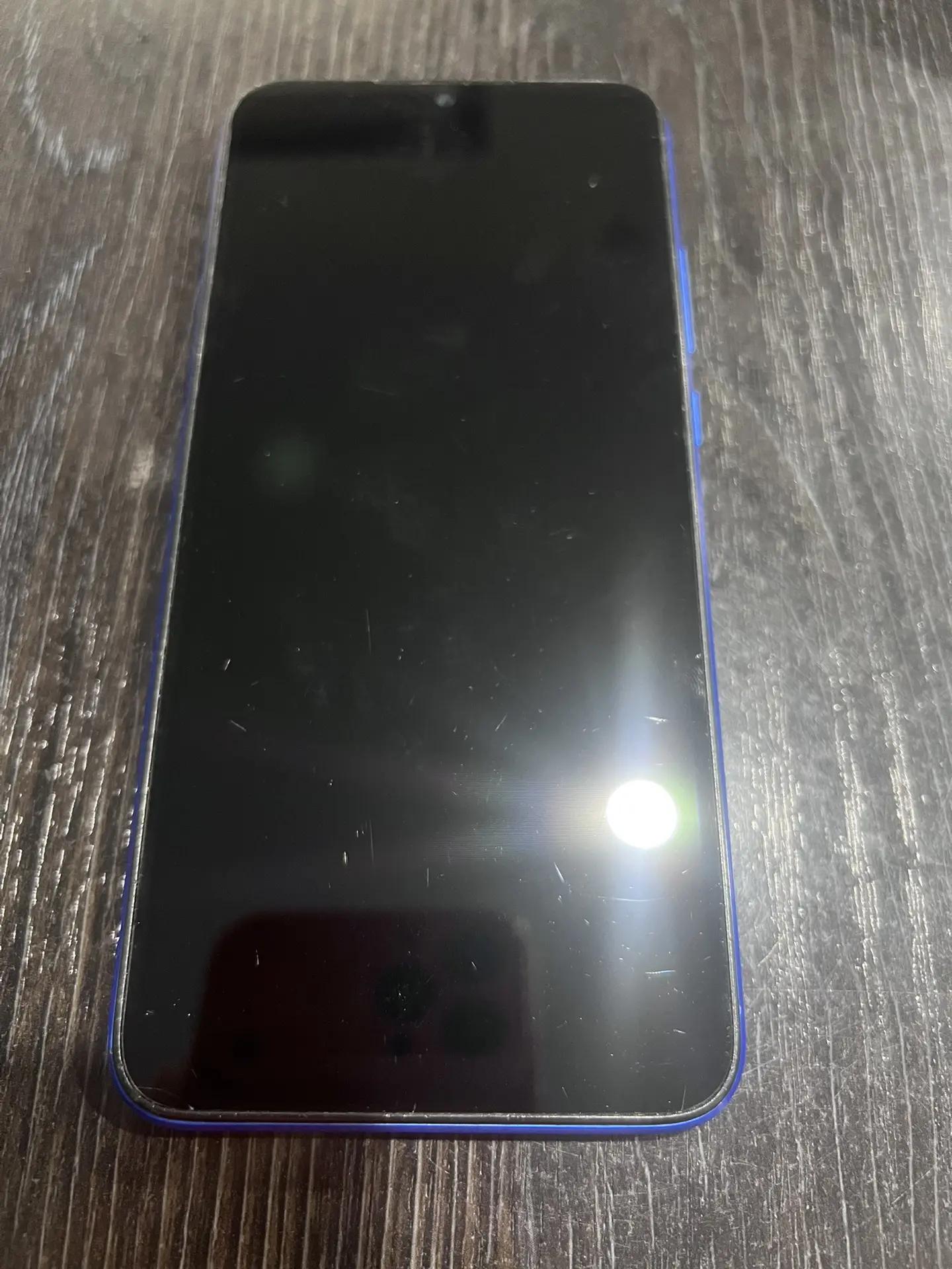 мобильный телефон Redmi в корпусе синего цвета с сим-картой сотового оператора Билайн 1 Штука (шт)