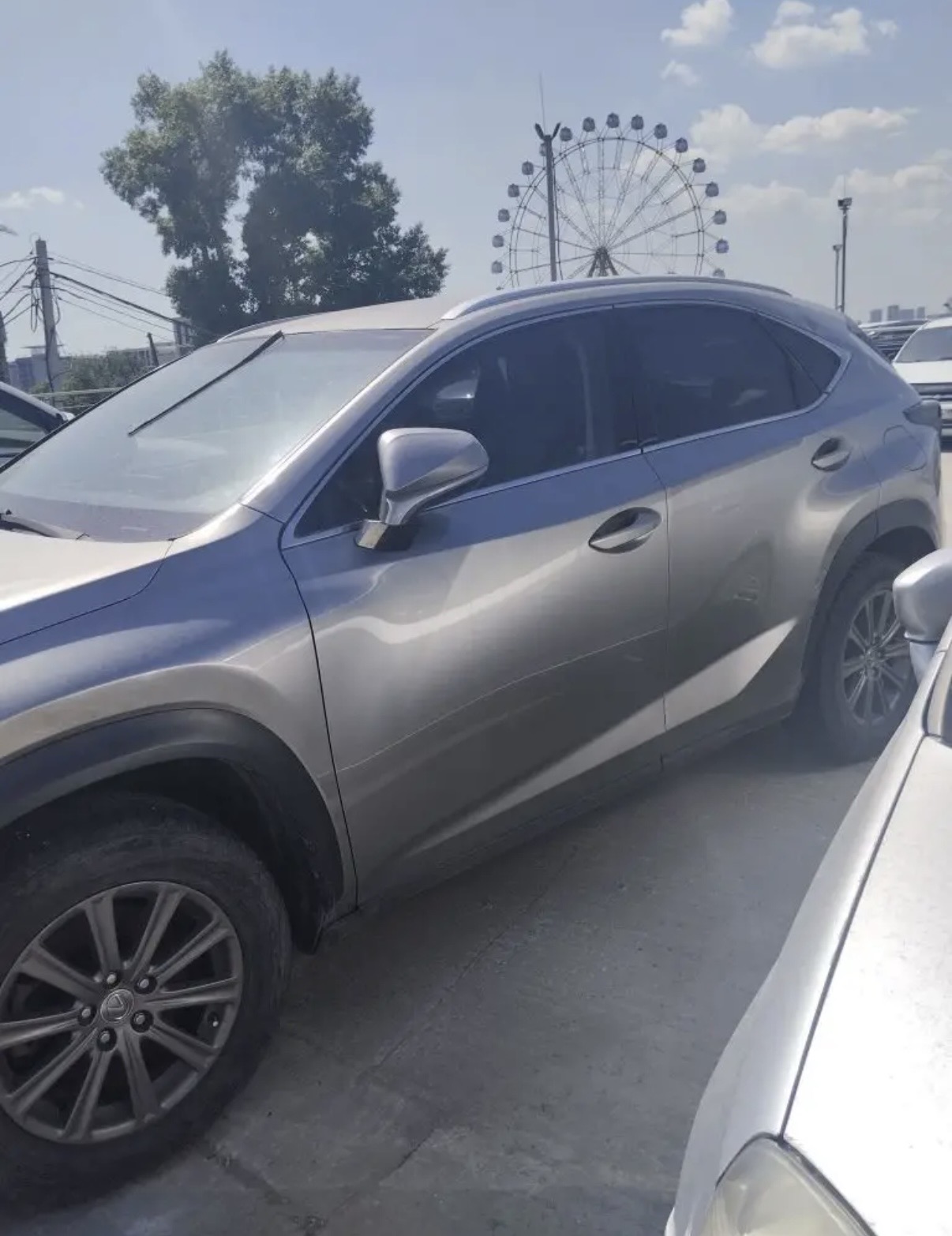 Легковой автомобиль LEXUS NX200, 2014 г.в., г/н: О563УК154, VIN:JTJYERBZ602000428, цвет светло-серый. Адрес: г. Новосибирск, ул. Большевистская, д. 45А. (залог)