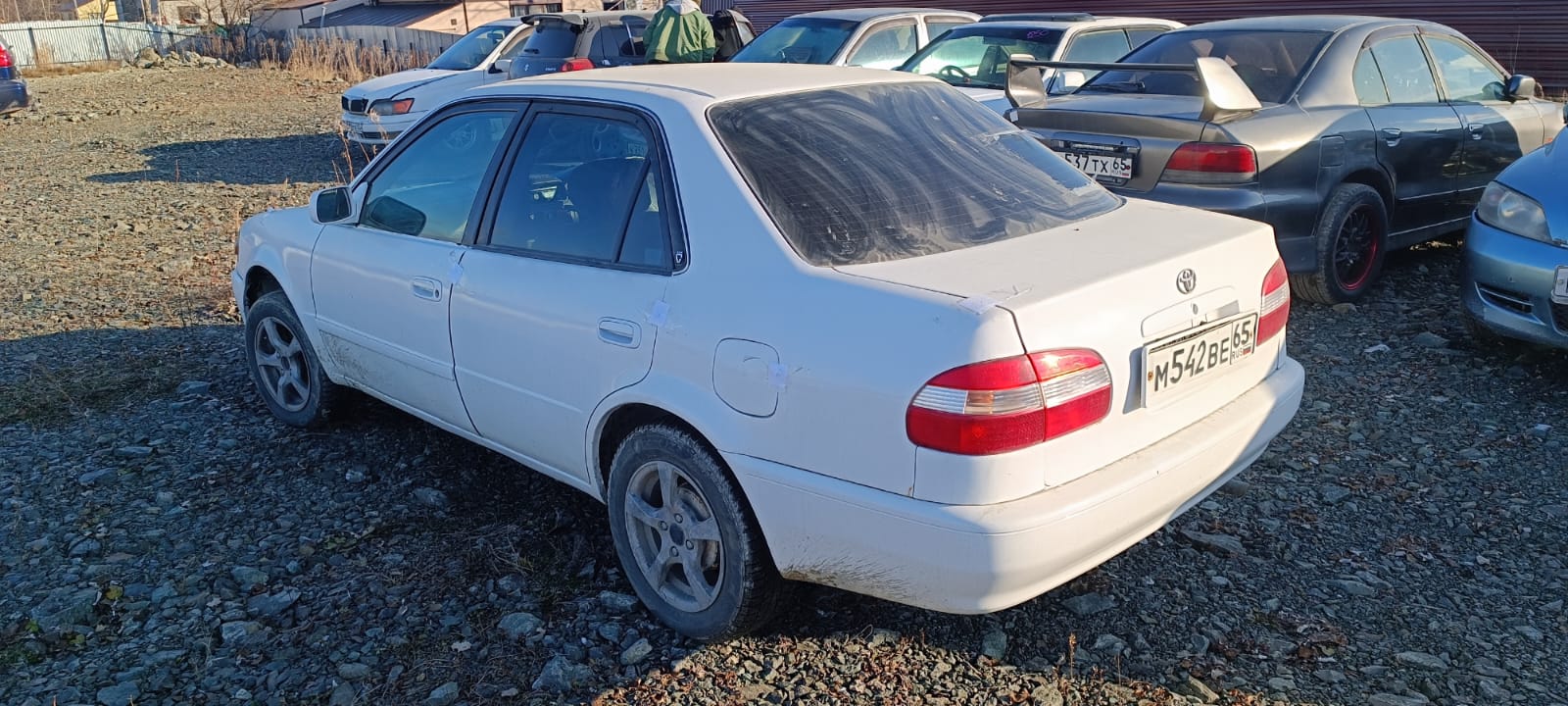 Автомобиль марки “Toyota Corolla”, государственный номер М 542 ВЕ 65