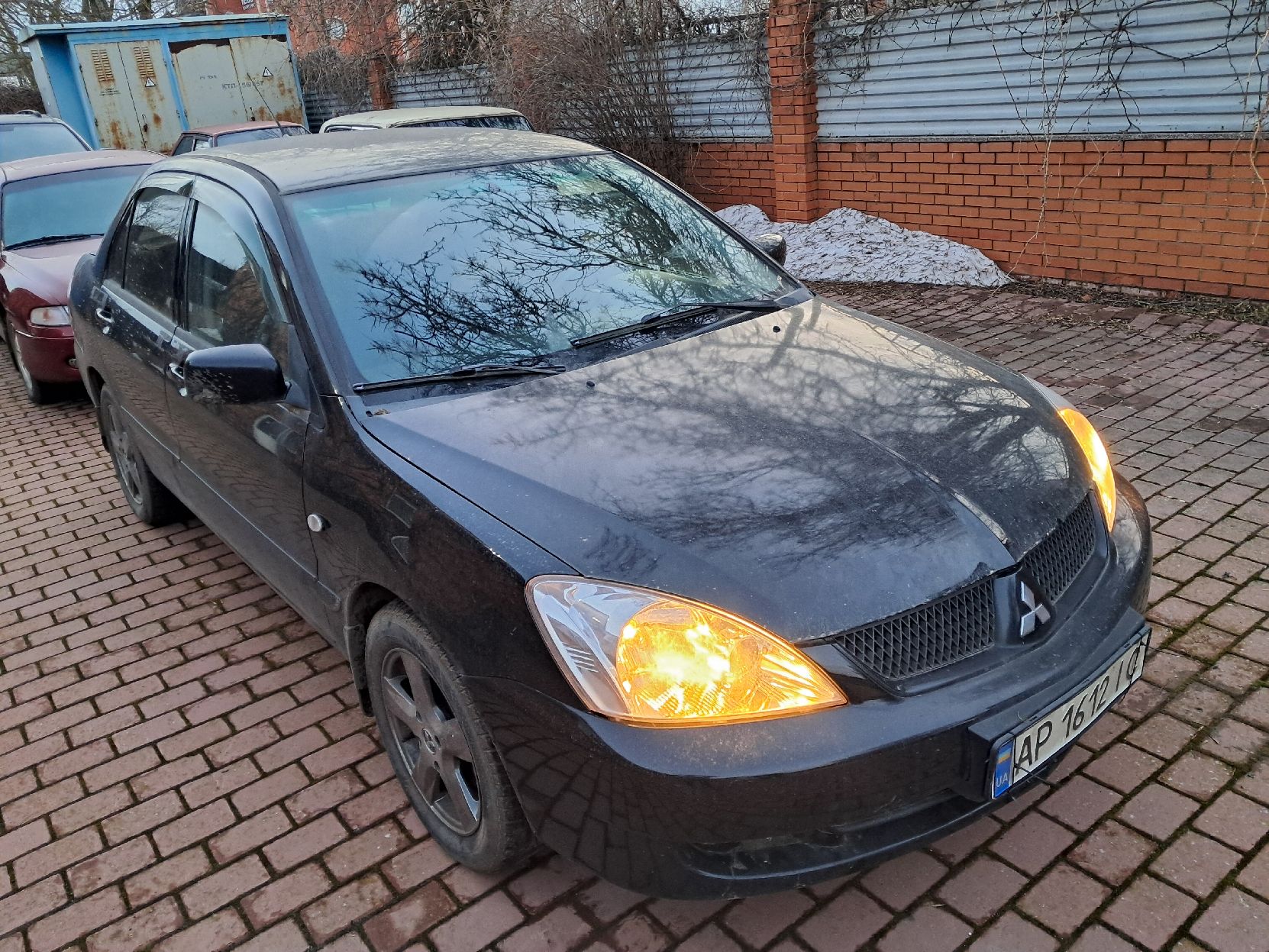 Транспортное средство марки "Mitsubishi" модели "Lancer" с г.р.н.АР16121С VIN:JMBSNCS3A7U000386, 2006г.выпуска,черного цвета.
