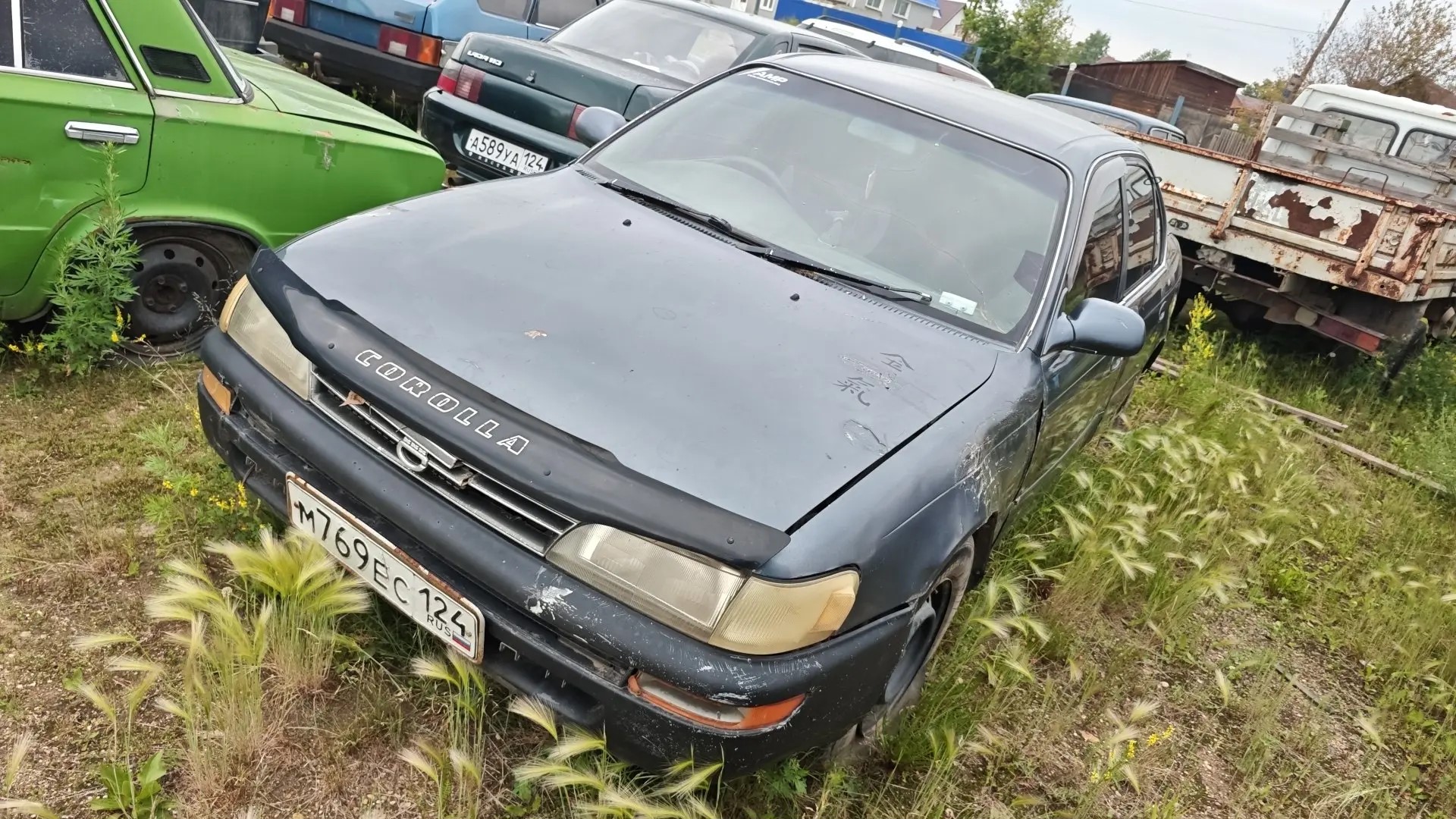 Автомобиль TOYOTA COROLLA, г/н М769ЕС124, 1992г.в., № кузова АЕ100-3134456. Рабочее состояние, и комплектность автомобиля не проверялось. Находится в г. Канск, данное имущество обращено в доход государства (Документы, ключи отсутствуют). (180/26)