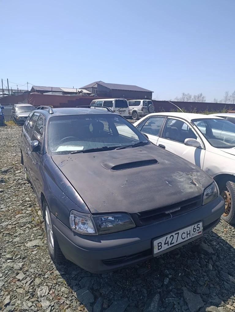 Автомобиль марки “Тойота Калдина” государственный номер В 427 СН 65