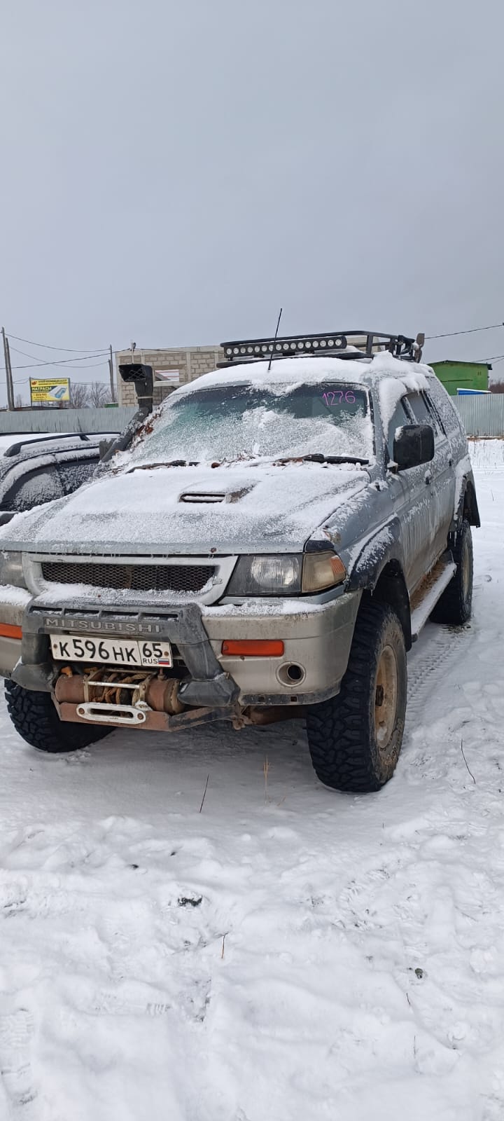 Автомобиль марки “Mitsubishi Challenger” государственный номер К 596 НК 65