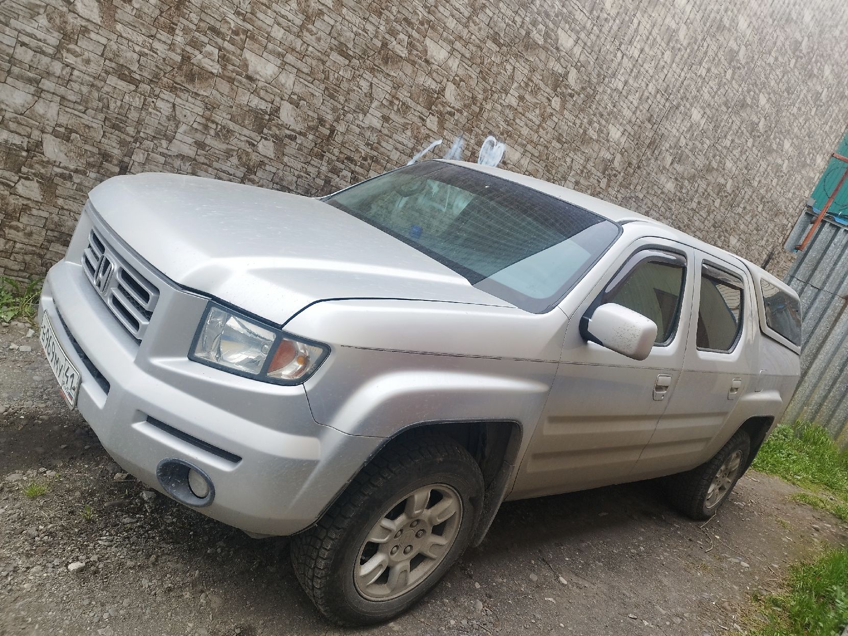 Автомобиль Honda Ridgeline, 2006 года выпуска, цвет - серый, государственный номер В969МУ41, идентификационный номер (VIN) 2HJYK16487H512426.