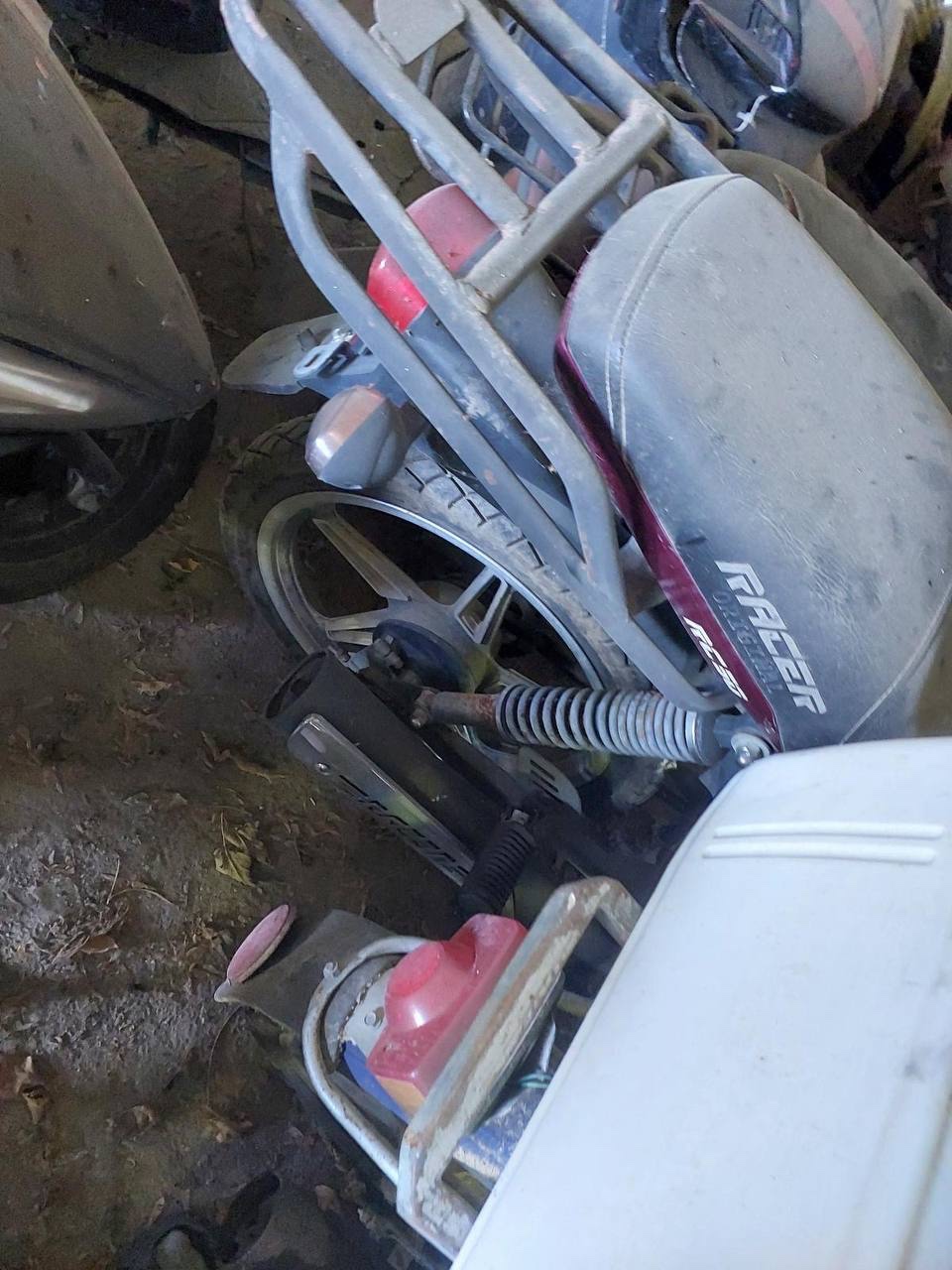 Мопед марки Racer RC50, год выпуска не установлен, в корпусе бордового цвета, без г.р.з.