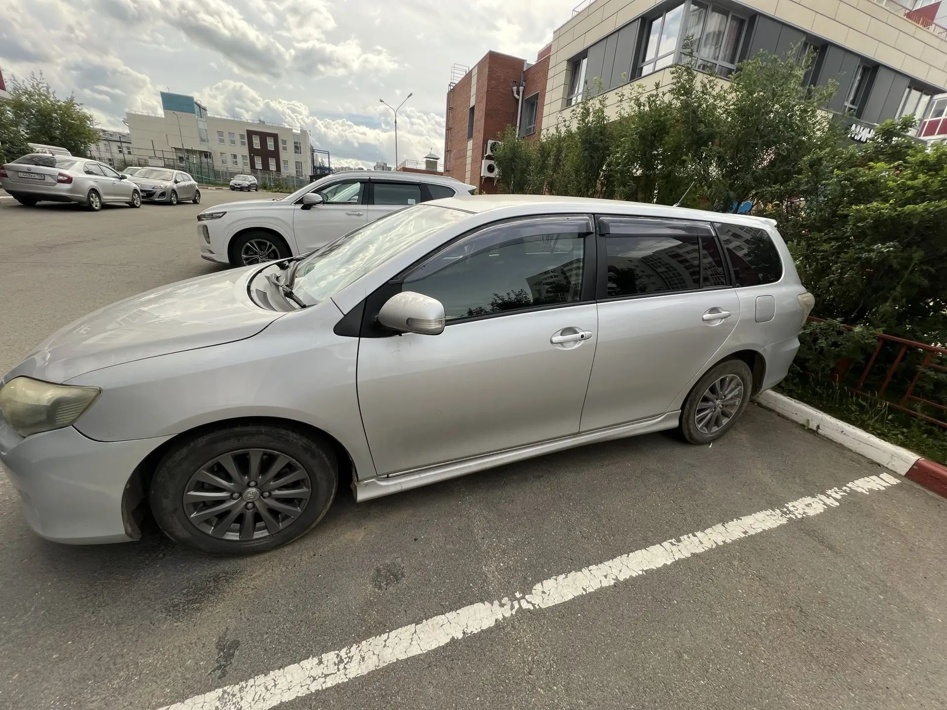 Автотранспортное средство Toyota Corolla Fielder, 2011 года выпуска, номер кузова (прицепа) ZRE1449011562.