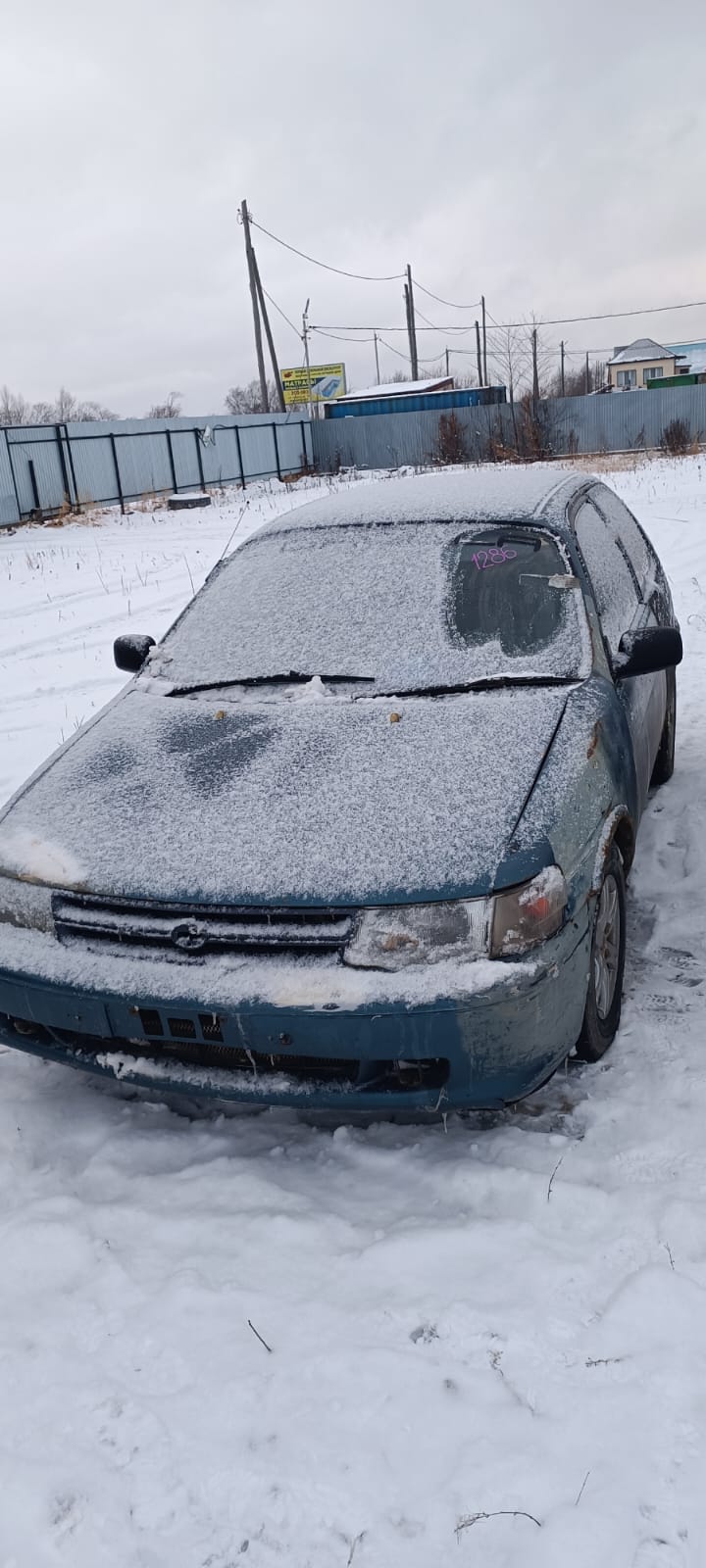 Автомобиль марки “Toyota Corolla 2” государственный номер К 032 АЕ 65
