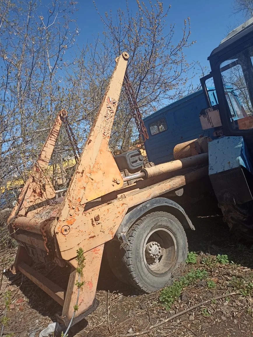 Мусоровоз портальный КО-440А