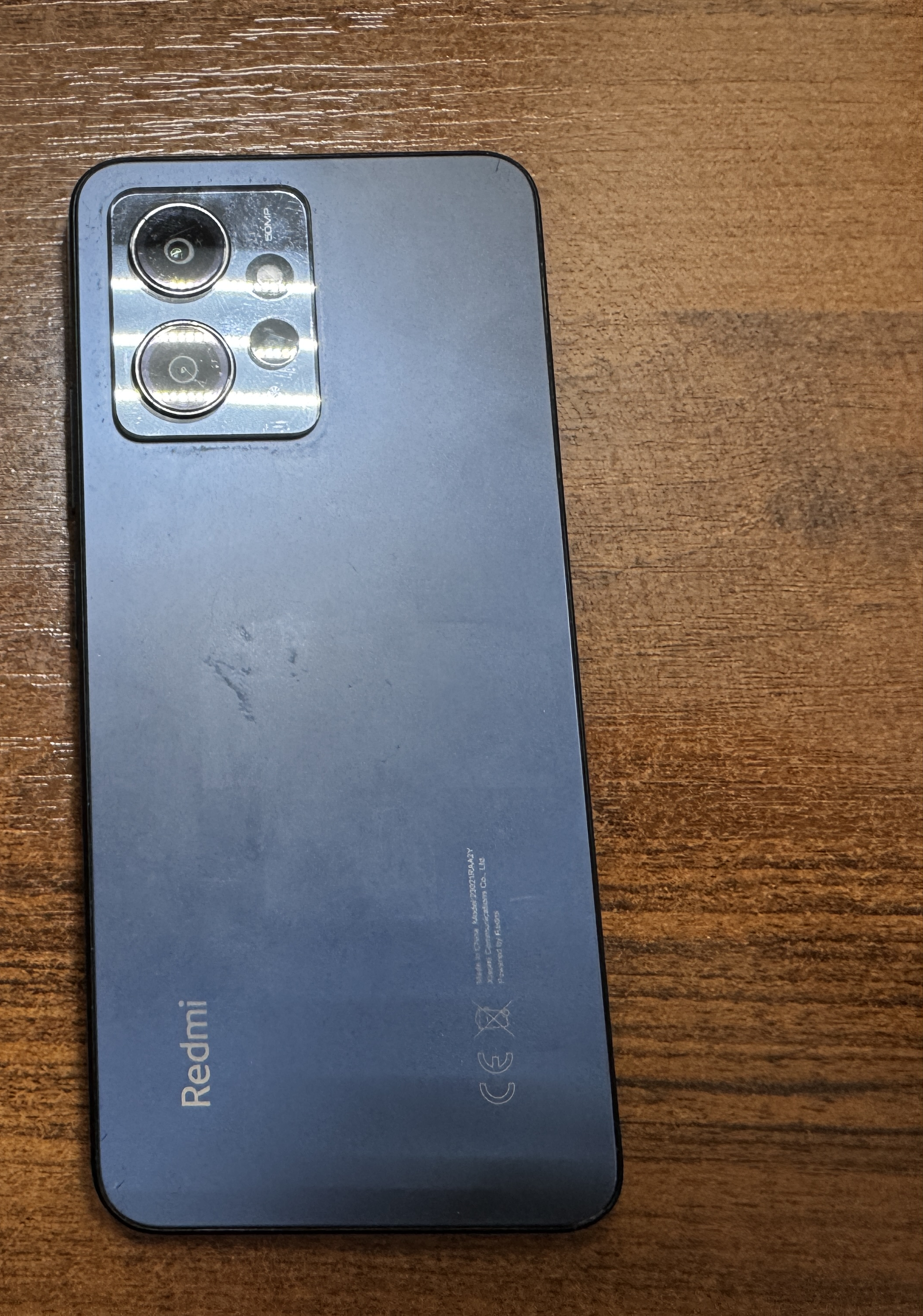Сотовый телефон марки «Xiaomi Redmi Note 12», б/у, черного цвета