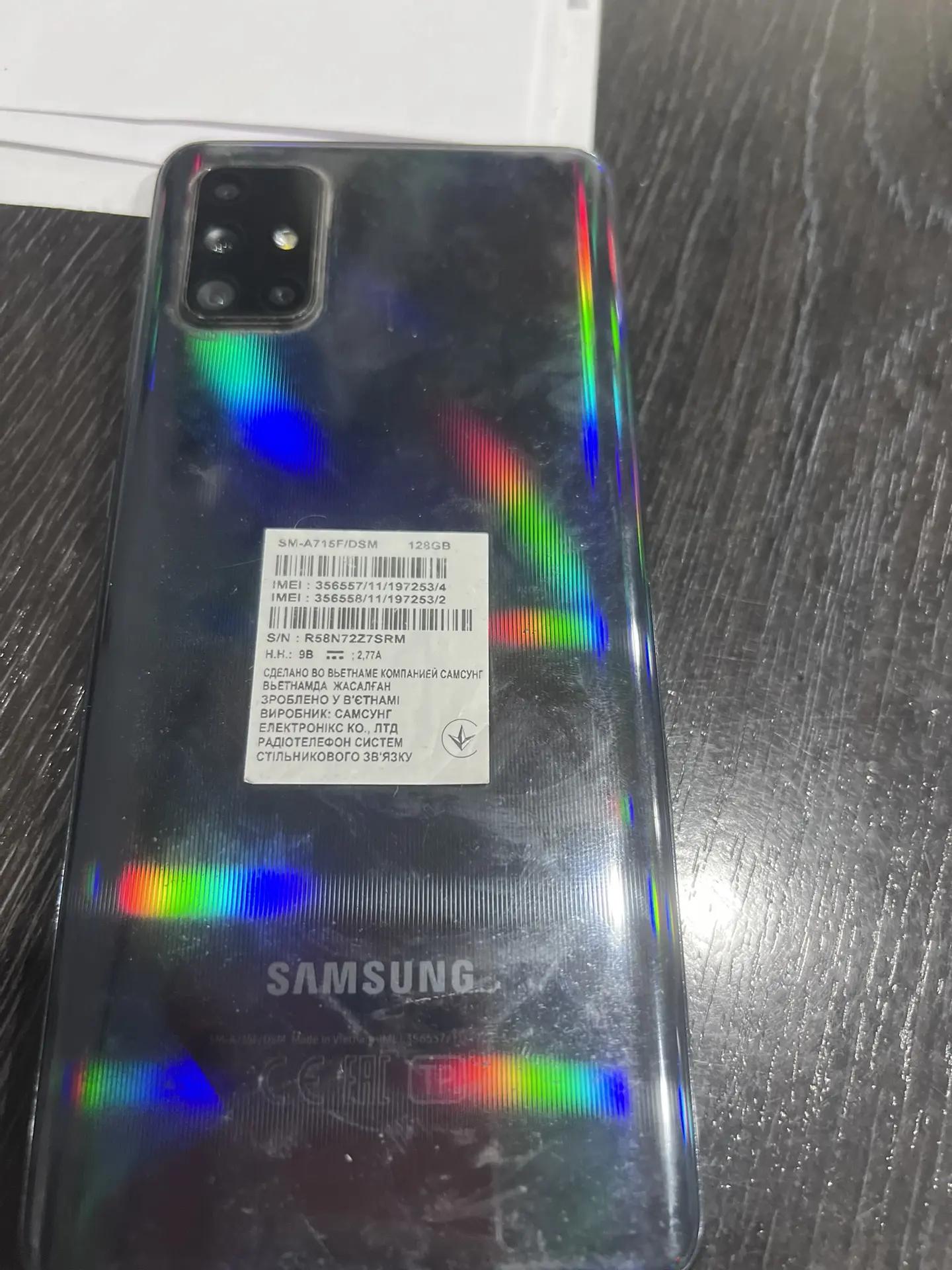 Сотовый телефон (смартфон) марки: "SAMSUNG", модель: "Galaxy A71", номер модели: "SM-A715F", серийный номер: "R58N72Z7SRM", IMEI (гнездо 1): 356557111972534, IMEI (гнездо 2): 356558111972532, в корпусе синего цвета с двумя сим-картами: № 8970102 698 183 6145 1 (оператор сотовой связи  1 Штука (шт)