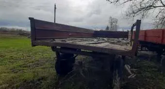тракторный прицеп мод 2ПТС-4-887Б, 2001 года выпуска, заводской номер машины 131594, цвет зеленый, паспорт самоходной машины и других видов техники ВА 364945