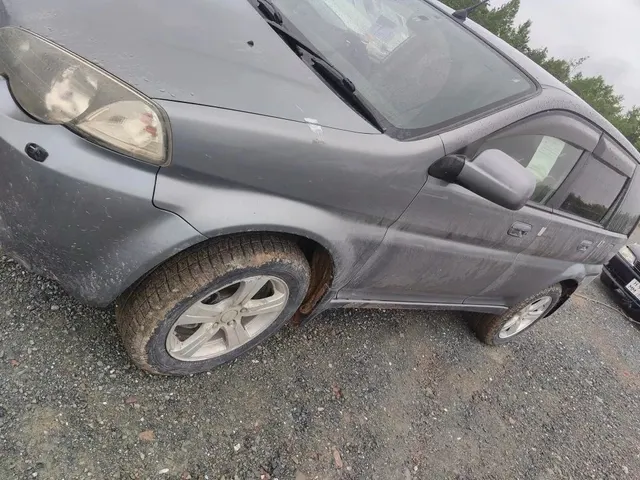 Автомобиль марки “Хонда Н- RV” государственный номер М 997 СА 65.