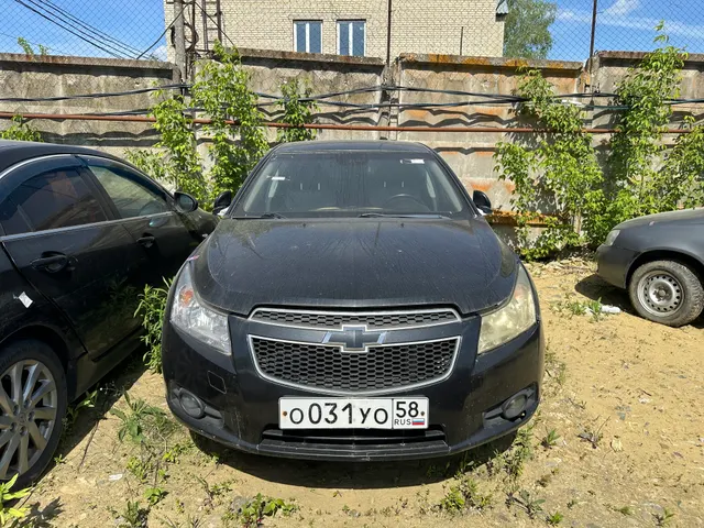 Автомобиль марки  Chevrolet KL1J CRUZE, государственный регистрационный знак  О031УО58 VIN XUFJF686JC3058886, цвет: черный металлик,  2012 г/в (58-003363-1)