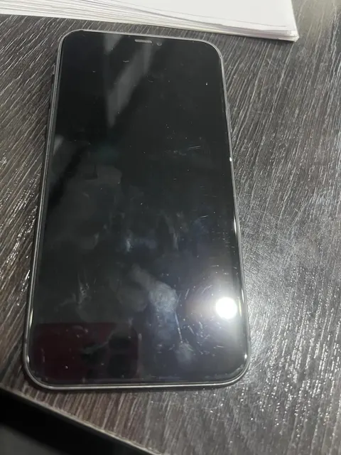 Мобильный телефон марки "Iphone" в корпусе темно-серого цвета 1 Штука (шт)