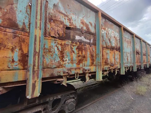 Полувагон 4-осный с люками в полу без тормозной площадки