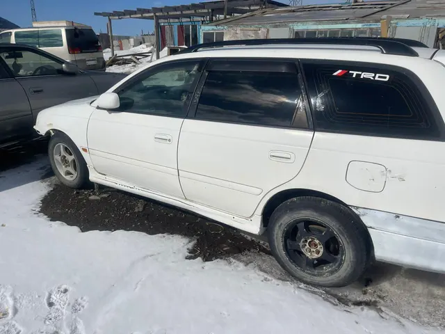 Автомобиль марки “Toyota Caldina” регистрационный номер М 894 ТТ65