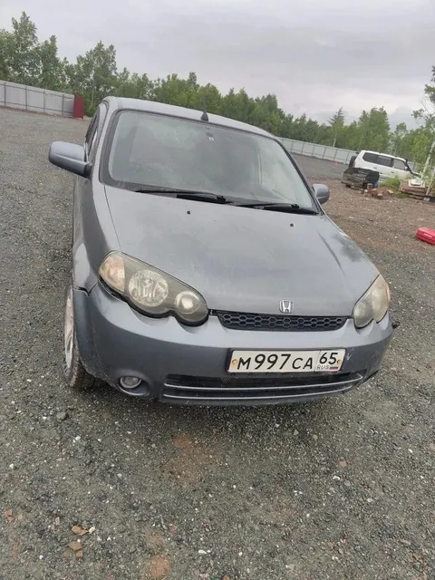 Автомобиль марки “Хонда Н- RV” государственный номер М 997 СА 65.