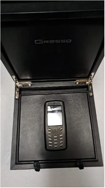 Мобильный телефон «Nokia 3310 by Gresso Black Limited Edition 0069/3310» в титановом корпусе, IMEI 358573087777235/358572085207237, с 3 переходниками, инструкцией и гарантией, в футляре с надписью «Gresso»