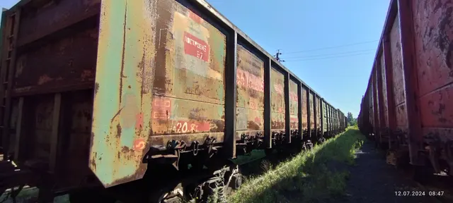 Полувагон 4-осный с люками в полу без тормозной площадки