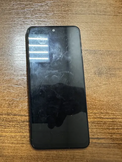 Сотовый телефон марки «Xiaomi Redmi Note 12», б/у, черного цвета