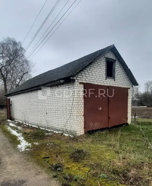 Здание - гараж для легкового автомобиля, 50,4 кв.м., Брянская обл., д. Случок. Лот №4