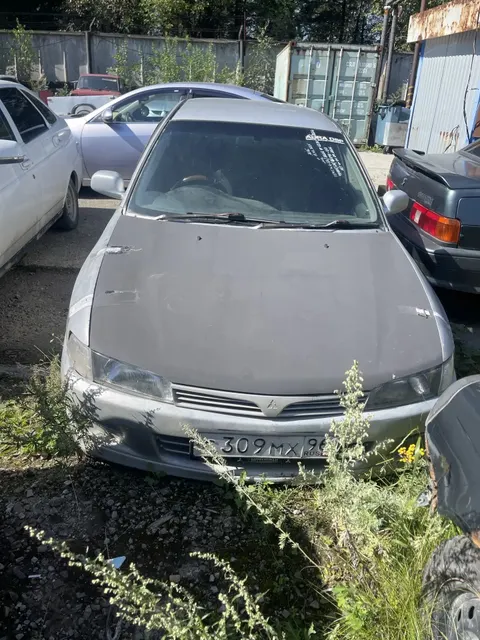 Имущество в качестве годных остатков : Автомобиль Митсубиси Лансер г.н. С 309 МХ 96, 1995 г. в., VIN CK2A0002428