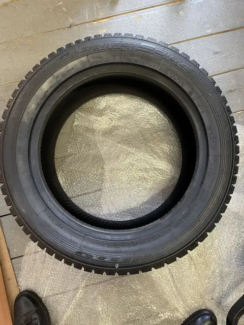 Автомобильная зимняя шина Nitto Therma spike 235/55 R18