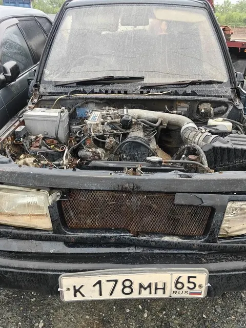 Автомобиль марки “Сузуки Эскудо”, государственный номер К 178 МН 65