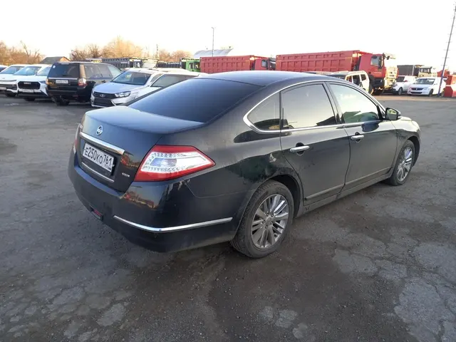 Легковой автомобиль (седан) NISSAN TEANA, 2011 г.в., г/н Е250КО761, VIN Z8NBBUJ32BS026319, черного цвета, имеются сколы, царапины по всему кузову, имеются повреждения переднего бампера, капота, заднего правого крыла, крыши автомобиля, в залоге, должник Родионова М.А., (Поручение ТУ Росимущества в РО от 20.07.2026 № 61-988-У). Адрес (местоположение): Ростовская область, г. Аксай, ул. Западная, д. 2Д.