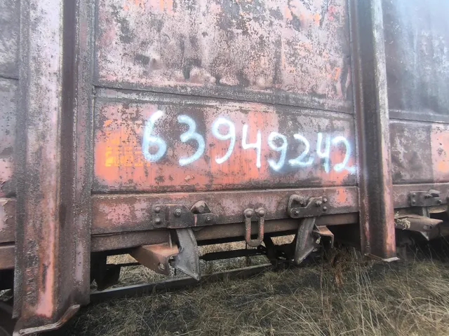 Полувагон 4-осный с люками в полу без тормозной площадки
