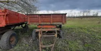 тракторный прицеп мод 2ПТС-4-887Б, 2001 года выпуска, заводской номер машины 131594, цвет зеленый, паспорт самоходной машины и других видов техники ВА 364945