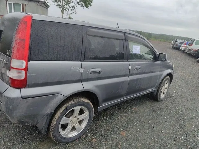 Автомобиль марки “Хонда Н- RV” государственный номер М 997 СА 65.