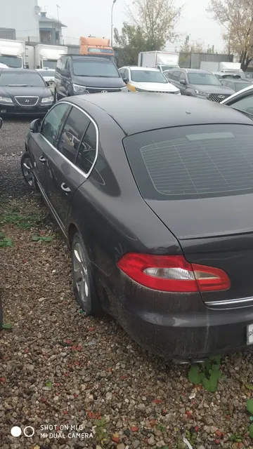 АМТС SKODA SUPERB, 2010 г.в., г/н: В108CX790, цвет темно-коричневый, VIN ТМВАВ6ЗТ9В90Зб9З7