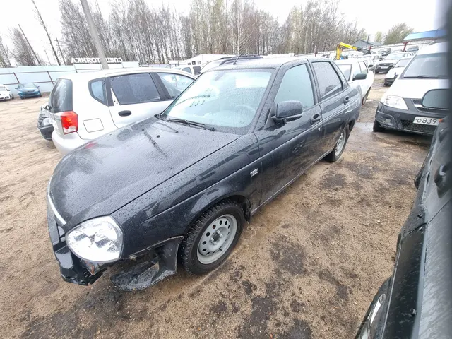 Автомобиль Лада 217030 Лада Приора, г.в. 2014, VIN: XTA217030E0466380, г/н: Е402КВ11, Документы: Нет, Ключи: Нет, Примечание: Цвет черный, следы коррозии по ЛПК, передний бампер разбит, правая передняя фара отсутствует, вмятина на левой стороне, скол на лобовом стекле. АС ПИБИ: 11-009285-1