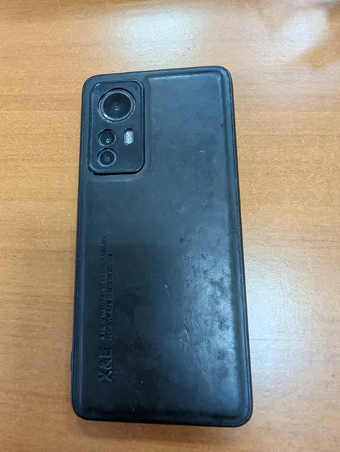 Мобильный телефон Xiaomi 12  (1 шт.) (в качестве годных остатков)
