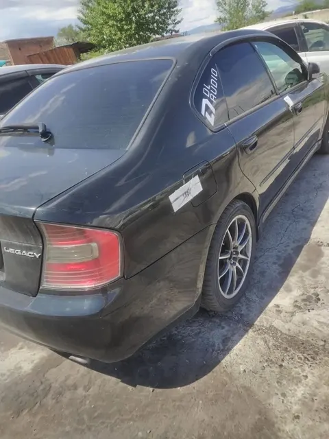 Транспортное средство марки «Subaru Legacy», 2005 года выпуска, номер кузова «BL5-039204», регистрационный номерной знак 01 KG678ADQ . (годные остатки) (задержанное)