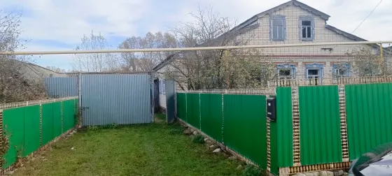 здание (жилой дом) с земельным участком,расположенный по адресу: Республика Татарстан, Дрожжановский муниципальный район, Стародрожжановское сельское поселение, с. Старое Дрожжаное, ул. 50 лет Октября, д.56
