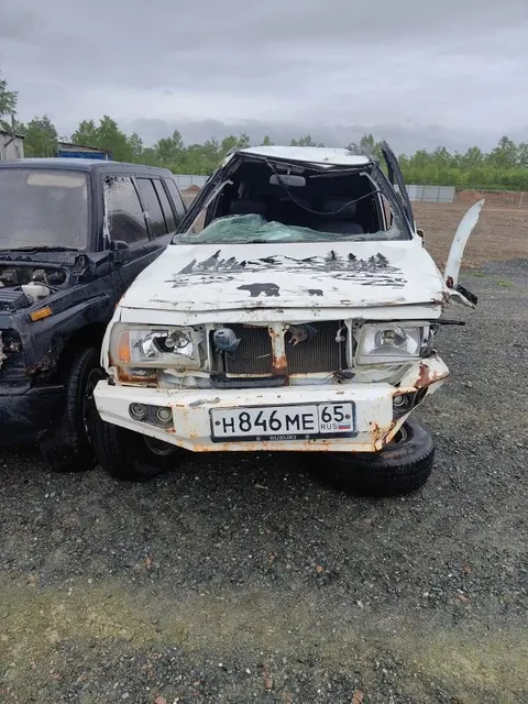 Автомобиль марки "Сузуки Эскудо", государственный номер Н846МЕ65, 1997 г.в., белого цвета
