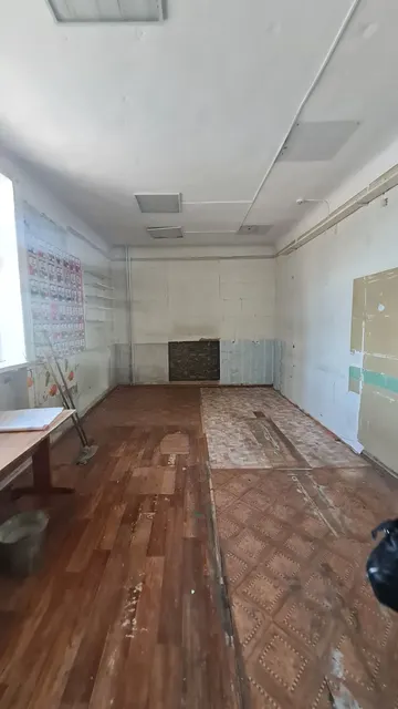 нежилые помещения магазина на 1 этаже  жилого дома площадью 52,3 кв. метра
