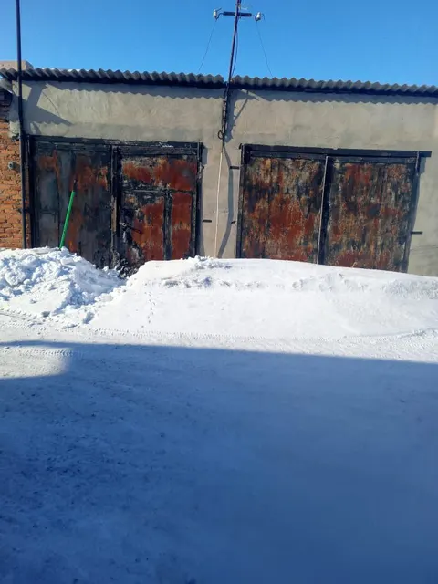 земельный участок площадью 99 кв. м с кадастровым номером 22:38:020855:99, РНФИ П11220001213 по адресу: Алтайский край, м.р-н Романовский, с.п. Романовский сельсовет, с. Романово, ул. Ленинская, з/у 78а с расположенным на нем объектом недвижимого имущества: Зданием автогаража бокс 2 площадью 41.9 кв. м с кадастровым номером 22:38:020855:171, РНФИ П12220011741