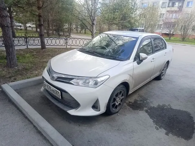 Автомобиль марки Toyota Corolla Axio., г/н Р476НЕ27 ,2017 г.в., № кузова RE160-7017808, цвет белый,трещина на лобовом стекле,вмятина на богажнике
