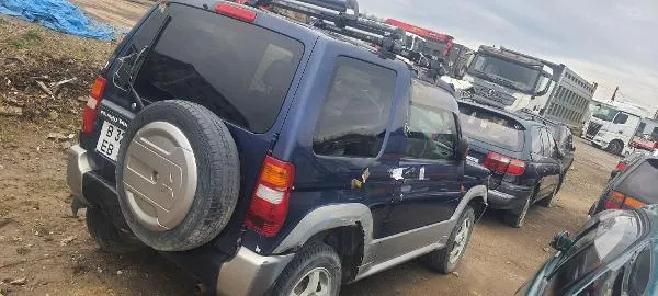 Автомобиль марки «MITSUBISHI PAJERO MINI», г/н в 328 ЕВ 49, 2001 г.в., цвет синий-серый Идентификац. номер (VIN) ОТСУТСТВУЕТ; Код ТИПА 29, Легковой прочее Категория В/М1 Модель, номер двиг.: 107778; Номер шасси (рамы): ОТСУТСТВУЕТ; Номер кузова (прицепа) H58A0210263; Код цвета кузова 6; Мощн. Двиг. л.с. (кВт) 64 (47.1); Объем двигателя, см. куб 659; Масса разр./без нагр., кг 1170/950