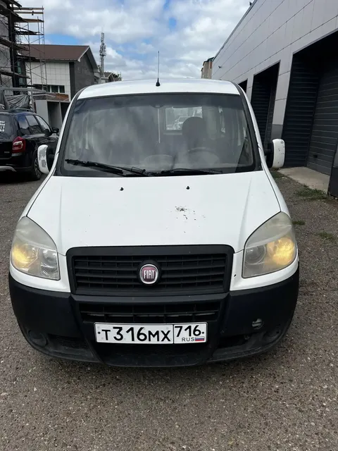 Автомобиль FIAT DOBLO, год выпуска 2010, VIN XU3223000AZ306505, цвет белый,  пробег 266555 км
