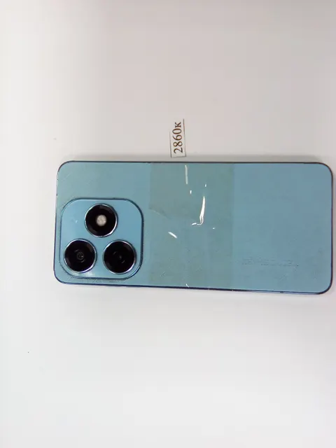 Сотовый телефон "Tecno", модель "Spark 20"