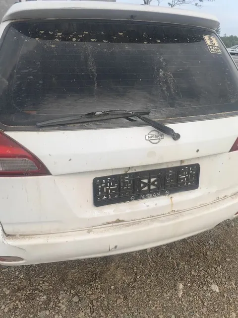 Автомобиль марки “Ниссан Вингроад” , без государственного номера, № кузова WHNY11202731, белого цвета, 2001 г.в.