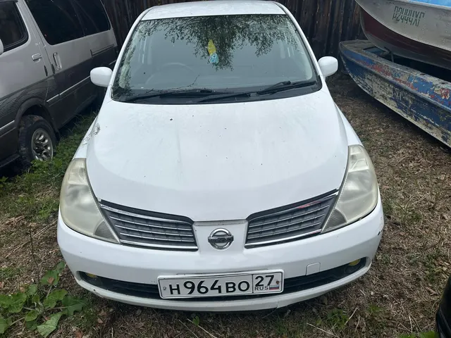Автомобиль марки Nissan Tiida Latio,Н964ВО27 г/н ,  2007г.в., № двигателя 251544А , № кузова  SNC11122582, цвет белый